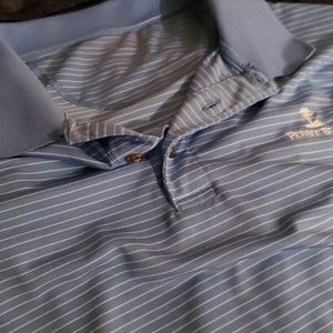 Im selling a light blue with stripes polo pebble b